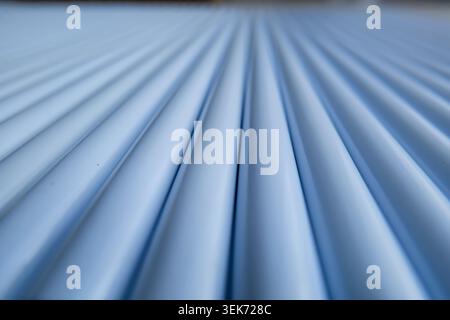 Close-up of Light Blue Corrugated Metal Surface Stock Photo