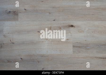 top view of a clean light wooden floor texture, natural laminate or parquet planks background with copy space Stock Photo
