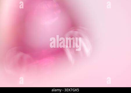 Abstract Pink Background with Blurred Shapes and Soft Light Patterns Stock Photo