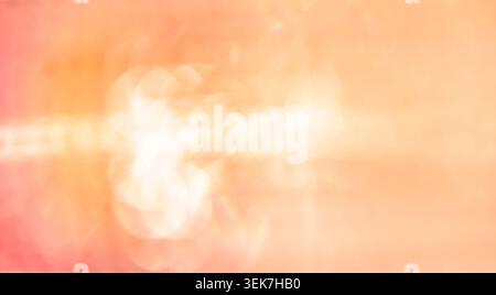 Vibrant Abstract Light Bokeh in Warm Orange and Pink Hues for Modern Design Stock Photo