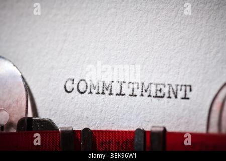 commitment word message concept written with a typewriter Stock Photo