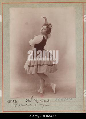 Mlle Tetard performs as a dancer at the Opéra in Paris in 1890, photographed by Atelier Nadar in a studio demonstration photograph that records costume, posture, and theatrical presentation linked to ballet performance. Stock Photo