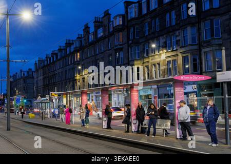People waiting to catch public transport, Edinburgh, Scotland Stock Photo