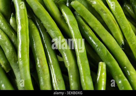 Raw organic green beans pattern top view. Stock Photo