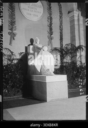 A war memorial at the Palais de Justice in Paris is recorded in a press photograph dated 2 December 1922, associated with an inauguration ceremony and commemorating losses from the First World War. Stock Photo