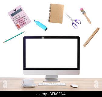 Web design tools flying around computer. Creative designer workspace Stock Photo