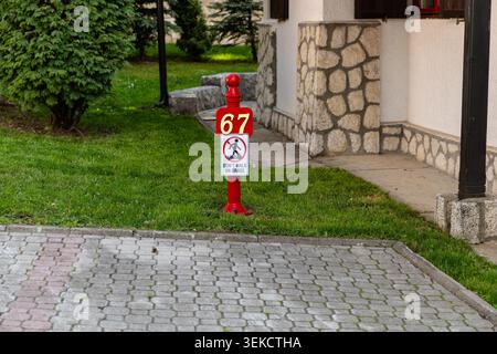 Serbia Zlatibor 24.05.2026 Dont Walk Grass Red Warning Post Stock Photo