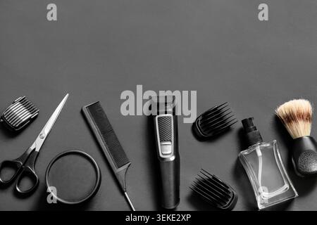 Modern trimmer and shaving accessories on black background Stock Photo