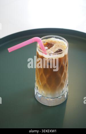Iced coffee on a round green tray Stock Photo