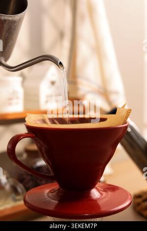 Pouring Hot Water to V60 Filtered Manual Coffee Stock Photo