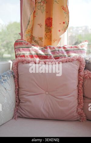 Pillow on a sofa in a bright room with natural light Stock Photo