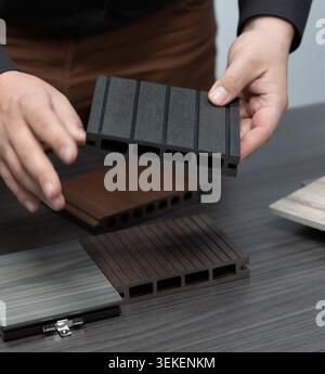 shopping for flooring tiles from samples on a table Stock Photo