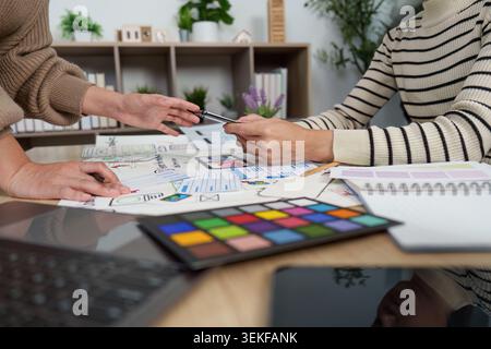 Women designers collaborating on UI UX mobile app development Stock Photo