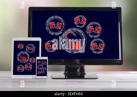 Spam concept shown on different information technology devices Stock Photo