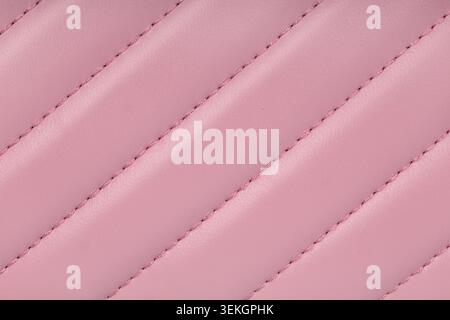 Pink quilted leather texture background surface Stock Photo