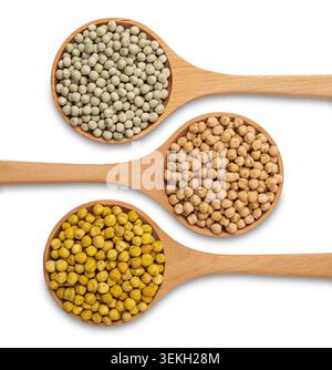 Assorted peas and chickpeas in wooden spoons isolated on white background featuring green peas, roasted peas and chickpeas. Stock Photo