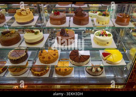 Various cakes in the display case of a pastry shop in Famagusta on Cyprus Stock Photo