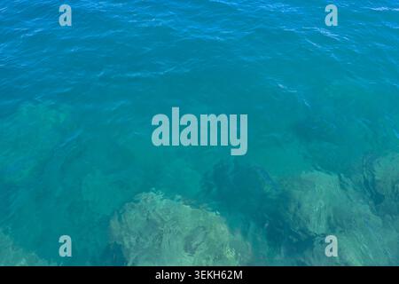 The texture of the transparent turquoise water of the Ionian Sea, Zakynthos Island Stock Photo