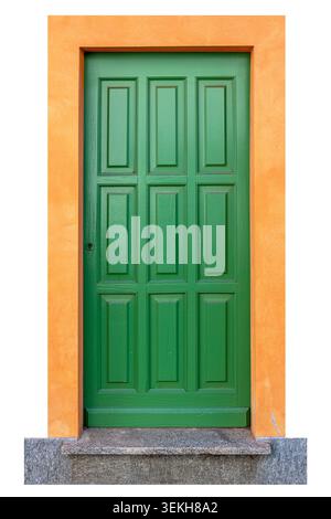 Green wooden door with nine rectangular rusticated panels set orange plaster frame, resting on gray stone threshold. isolated on white, clipping path Stock Photo