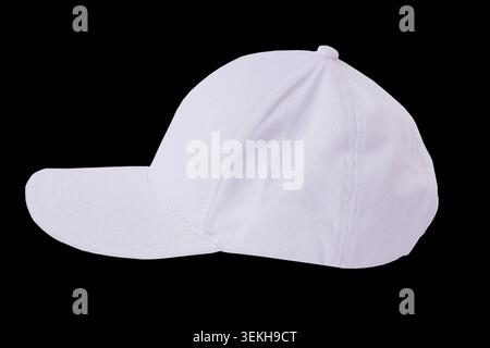 Classic White Cotton Baseball Cap: Blank Twill Unbranded Hat Design isolated on black background. Stock Photo
