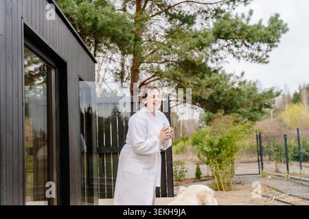 Young White Couple Drinking Tea Inside Wooden Sauna Stock Photo