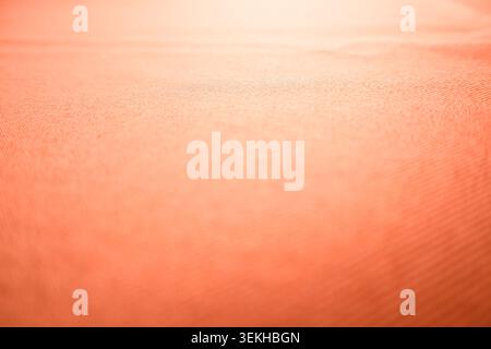 Yellow natural vibrant linen textile background. Top view. Flat lay, copy space. Abstract orange fabric cloth background Stock Photo