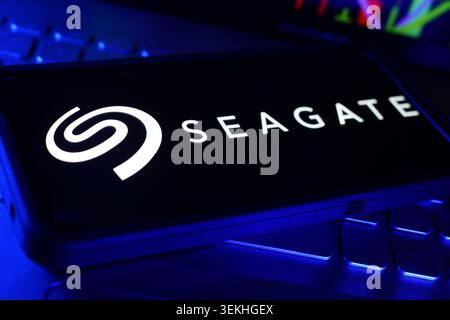 Seagate Technology Company Logo On Screen Display With Computer Technology Keyboard Background And Data Storage Hardware Workspace Stock Photo