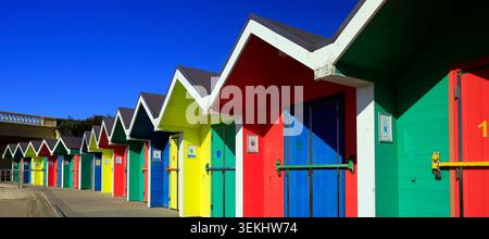 Colourful painted bathing huts at Barry Island beach, South Wales, UK Stock Photo