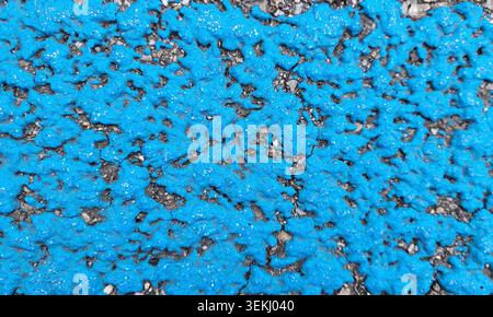 Abstract Turquoise and Gray Asphalt Texture with Uneven Surface Pattern Stock Photo