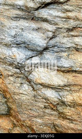 An Organic Texture Background with a Natural Stone Surface in Warm Earth Tones Stock Photo