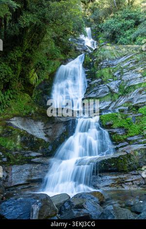 Long exposure image of Depot Creek Falls in Haast, South Island, New Zealand Stock Photo