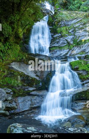 Long exposure image of Depot Creek Falls in Haast, South Island, New Zealand Stock Photo