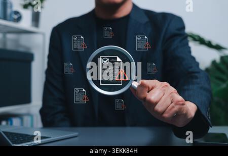 Document risk review and compliance audit warning concept. Businessman using magnifying glass to inspect files with alert icons. document validation, Stock Photo