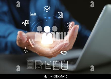 Employee recruitment using digital people team for human hr data, business management professional showing success icons on laptop for corporate growt Stock Photo