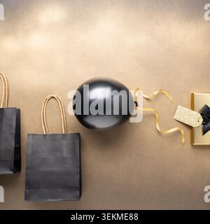 Black Friday shopping concept with bags balloon and gift box square background Stock Photo