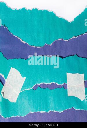 Torn pieces of turquoise paper contrasting with an blue background, attached with adhesive strips, creating an abstract design, modern creative mockup Stock Photo