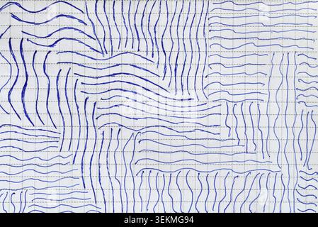 An abstract drawing done with blue pen on paper. The drawing consists of many short, repeating lines arranged in groups with varying orientations. Stock Photo