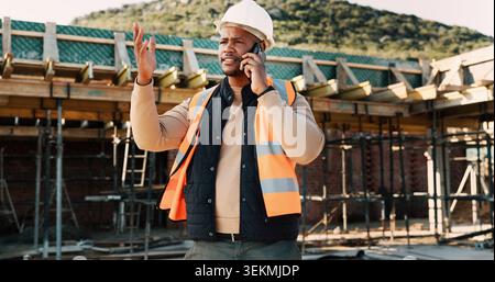 Phone call, upset and construction worker on site with communication for feedback on building. Cellphone, black man and civil engineer on mobile Stock Photo