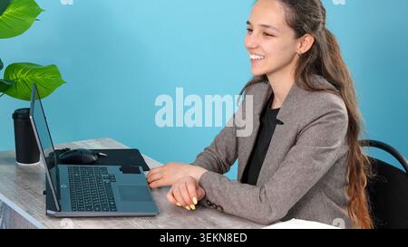 Modern corporate teamwork workflow with smiling corporate manager discussing Stock Photo