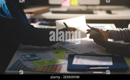 Team of Program Developer Collaborating on UXUI Design Planning in a Modern Office Environment Stock Photo