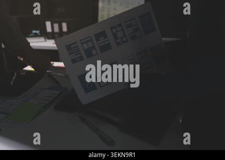 Team of Program Developer Collaborating on UXUI Design Planning in a Modern Office Environment Stock Photo