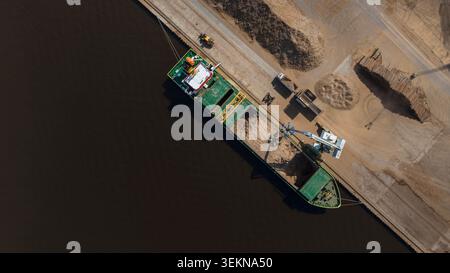 Directly above shot of ship moored at harbor construction Stock Photo
