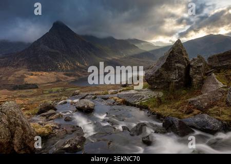 Tryfan and Llyn Ogwen from the Afon Lloer, Snowdonia National Park, North Wales, UK.  Spring (March) 2026. Stock Photo