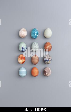 Row of decorative Easter eggs with various patterns and colors Stock Photo