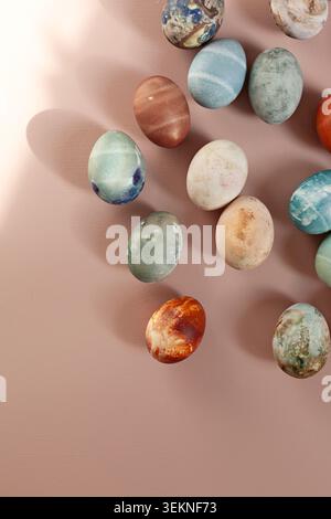 Directly above shot of hand-painted eggs in various natural shades Stock Photo