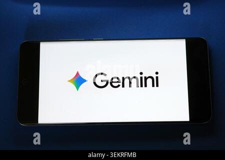 Gemini logo displayed on a smartphone screen Stock Photo
