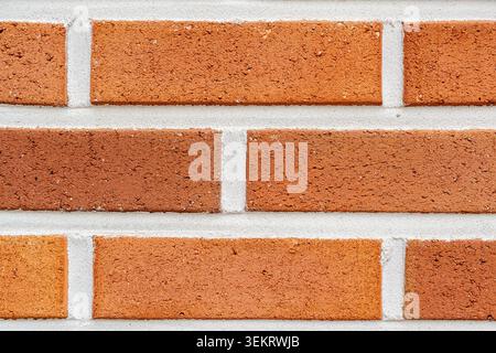 Close-Up of Orange Brick Wall Texture Stock Photo