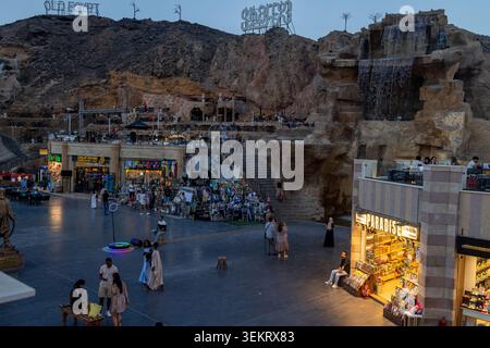 Sharm El Sheikh Egypt, 1st May 2026: Evening scene at Old Market Sharm El Sheikh Egypt with illuminated shops artificial waterfall visitors and vibran Stock Photo