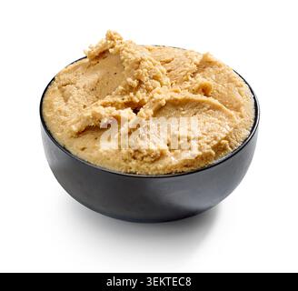 bowl of hazelnut and cashew nut cream isolated on white background, healthy nut butters, including peanut butter, cashew butter, and hazelnut cream, s Stock Photo