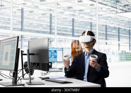 Testing microchip electronics prototypes, VR tech and Asian man. Ensuring industrial hardware standards, virtual reality goggles and senior manager in semiconductors RD laboratory Stock Photo